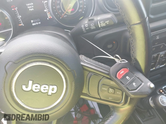 2021 Jeep Wrangler Unlimited Willys with VIN 1C4HJXDN1MW616467, listed as a IAAI auction lot 41791928 with 88,618 mi miles and . Bid and sale history available at DreamBid. Image 11.