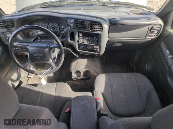 2003 GMC Sonoma SLS z VIN 1GTDT19X838102330, wystawiony jako Copart lot #44064695 z przebiegiem 165 227 mil mil oraz Szkoda całkowita • Salvage title. Historia ofert i sprzedaży dostępna na DreamBid. Obrazek 8.