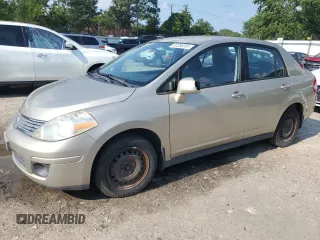 2009 Nissan Versa S with VIN 3N1BC11E09L418934, listed as a Copart auction lot 63286205 with 74,733 mi miles and Salvage title. Bid and sale history available at DreamBid. Image 1.
