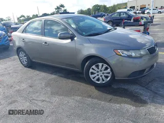 2013 Kia Forte EX with VIN KNAFU4A26D5655016, listed as a IAAI auction lot 42168521 with 201,262 mi miles. Bid and sale history available at carsss.com. Image 1.