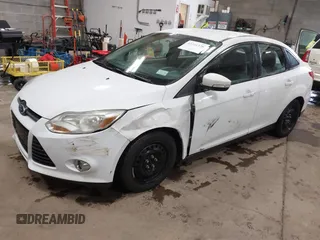 2012 Ford Focus SE с VIN 1FAHP3F21CL301085, выставлен на аукционе IAAI как лот 42321328 с пробегом 157 818 миль миль и . История ставок и продаж доступна на DreamBid. Изображение 2.