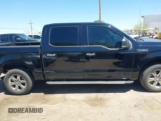 2018 Ford F-150 XL with VIN 1FTEW1C50JKF28600, listed as a IAAI auction lot 42081191 with 105,636 mi miles and . Bid and sale history available at DreamBid. Image 14.