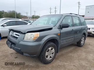 2007 Honda Pilot LX with VIN 5FNYF281X7B006877, listed as a IAAI auction lot 41595667 with 255,799 mi miles. Bid and sale history available at carsss.com. Image 2.