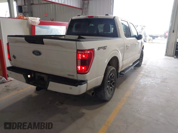 2023 Ford F-150 XL with VIN 1FTEW1EPXPKF97673, listed as a IAAI auction lot 41349562 with 35,687 mi miles. Bid and sale history available at carsss.com. Image 4.