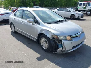 2006 Honda Civic z VIN JHMFA36216S000313, wystawiony jako IAAI lot #42146305 z przebiegiem 172 173 mil mil oraz . Historia ofert i sprzedaży dostępna na DreamBid. Obrazek 1.