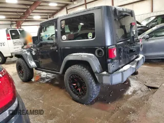 2010 Jeep Wrangler Rubicon with VIN 1J4BA6D10AL106213, listed as a Copart auction lot 86306184 with 180,825 mi miles and Clean title. Bid and sale history available at DreamBid. Image 2.