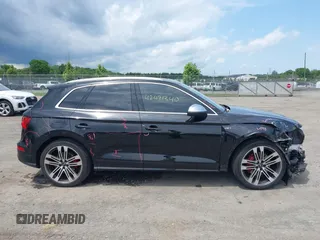 2018 Audi SQ5 Premium Plus z VIN WA1A4AFYXJ2169180, wystawiony jako IAAI lot #42471340 z przebiegiem 57 235 mil mil oraz . Historia ofert i sprzedaży dostępna na DreamBid. Obrazek 13.