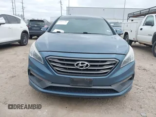 2015 Hyundai Sonata Sport with VIN 5NPE34AB5FH163825, listed as a IAAI auction lot 42013743 with Not Provided miles and . Bid and sale history available at carsss.com. Image 13.