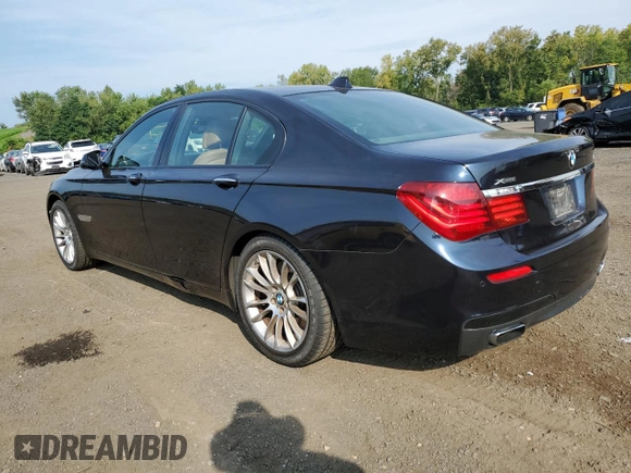 2015 BMW 7 Series 750i xDrive with VIN WBAYB6C53FD966042, listed as a Copart auction lot 69387464 with 64,977 mi miles and Salvage Title. Bid and sale history available at carsss.com. Image 2.