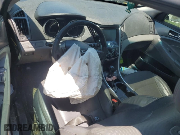2012 Hyundai Sonata Hybrid with VIN KMHEC4A48CA054212, listed as a Copart auction lot 56938545 with Not provided miles and Salvage title. Bid and sale history available at DreamBid. Image 8.