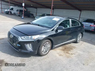 2021 Hyundai Ioniq SE with VIN KMHC65LD3MU249765, listed as a IAAI auction lot 41986977 with 63,363 mi miles and . Bid and sale history available at DreamBid. Image 2.