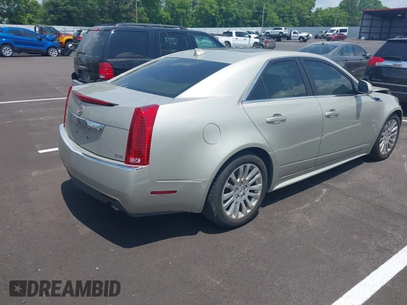 2013 Cadillac CTS Performance with VIN 1G6DK5E31D0146699, listed as a IAAI auction lot 42426214 with 96,520 mi miles and . Bid and sale history available at DreamBid. Image 4.