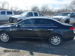 2012 Lincoln MKZ with VIN 3LNHL2JC4CR838515, listed as a IAAI auction lot 41879183 with 74,501 mi miles. Bid and sale history available at carsss.com. Image 14.