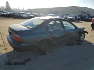1996 Honda Accord LX with VIN 1HGCD5636TA278854, listed as a Copart auction lot 88117305 with 218,132 mi miles and Salvage Title. Bid and sale history available at DreamBid. Image 3.
