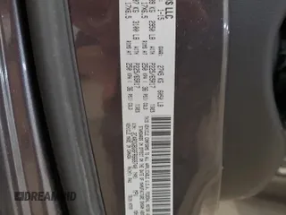 2015 Dodge Grand Caravan SE with VIN 2C4RDGBG6FR668740, listed as a Copart auction lot 50211885 with 129,695 mi miles and Salvage Title. Bid and sale history available at DreamBid. Image 13.
