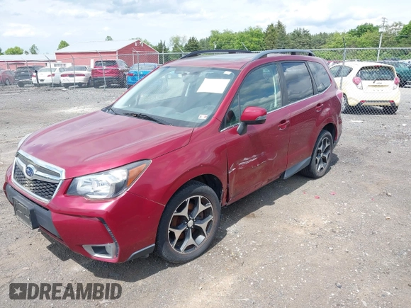 2014 Subaru Forester XT Touring with VIN JF2SJGMC1EH500150, listed as a IAAI auction lot 42201409 with 106,728 mi miles and . Bid and sale history available at DreamBid. Image 2.