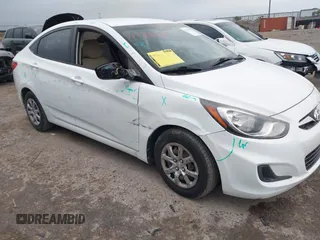 2014 Hyundai Accent GLS with VIN KMHCT4AE5EU649178, listed as a IAAI auction lot 41936729 with 102,737 mi miles. Bid and sale history available at carsss.com. Image 6.