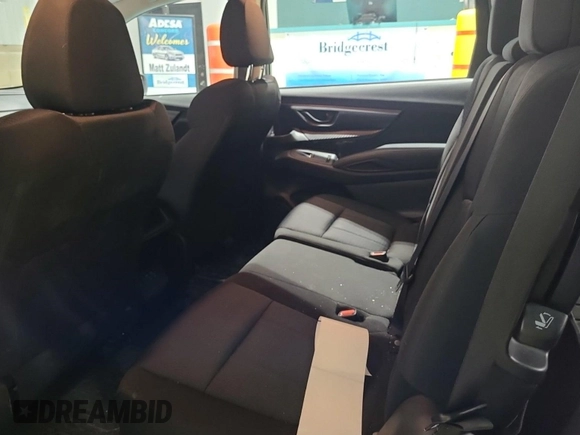2023 Subaru Ascent Premium with VIN 4S4WMAAD4P3404025, listed as a IAAI auction lot 42774227 with 59,195 mi miles and . Bid and sale history available at DreamBid. Image 13.