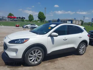 2021 Ford Escape Titanium with VIN 1FMCU9J91MUA29407, listed as a IAAI auction lot 42120442 with 19,314 mi miles and . Bid and sale history available at DreamBid. Image 14.