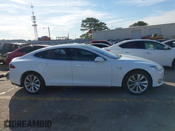 2014 Tesla Model S 60 with VIN 5YJSA1H13EFP62451, listed as a IAAI auction lot 41639068 with 88,000 mi miles and . Bid and sale history available at DreamBid. Image 13.