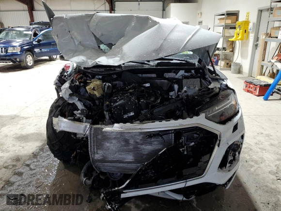 2023 Audi Q5 S line Prestige z VIN WA1FAAFY7P2165319, wystawiony jako Copart lot #83750474 z przebiegiem Nie podano mil oraz Szkoda całkowita • Salvage title. Historia ofert i sprzedaży dostępna na DreamBid. Obrazek 5.