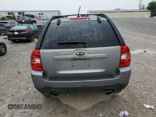 2010 Kia Sportage LX with VIN KNDKG3A42A7701087, listed as a Copart auction lot 52576435 with 143,450 mi miles and Clean Title. Bid and sale history available at carsss.com. Image 6.