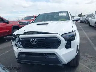 2024 Toyota Tacoma 4WD SR5 with VIN 3TYLB5JNXRT007339, listed as a IAAI auction lot 41432778 with 4,038 mi miles. Bid and sale history available at carsss.com. Image 12.