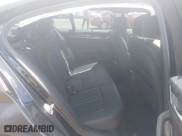 2023 BMW 5 Series M550i xDrive with VIN WBA13BK02PCN47443, listed as a IAAI auction lot 42290388 with Not provided miles and . Bid and sale history available at DreamBid. Image 8.