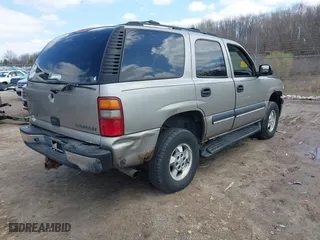 2003 Chevrolet Tahoe LT with VIN 1GNEC13Z63J100509, listed as a IAAI auction lot 42013681 with 1 mi miles. Bid and sale history available at carsss.com. Image 4.