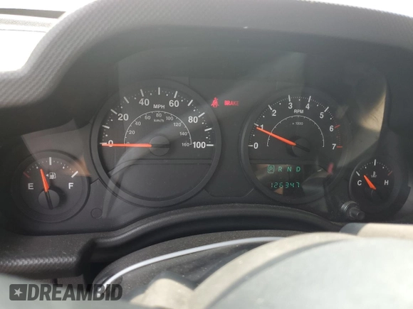 2007 Jeep Wrangler X with VIN 1J4FA24117L202404, listed as a Copart auction lot 58690485 with 126,347 mi miles and Salvage title. Bid and sale history available at DreamBid. Image 9.