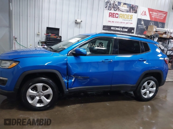 2020 Jeep Compass Latitude with VIN 3C4NJDBB1LT164874, listed as a IAAI auction lot 41364362 with 55,286 mi miles and . Bid and sale history available at DreamBid. Image 14.