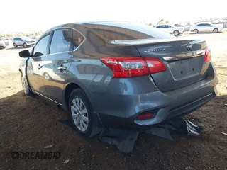 2019 Nissan Sentra S z VIN 3N1AB7AP2KY333766, wystawiony jako IAAI lot #41593714 z przebiegiem 79 811 mil mil oraz . Historia ofert i sprzedaży dostępna na DreamBid. Obrazek 3.