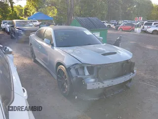2021 Dodge Charger R/T z VIN 2C3CDXCT8MH594715, wystawiony jako IAAI lot #42257288 z przebiegiem 11 570 mil mil oraz . Historia ofert i sprzedaży dostępna na DreamBid. Obrazek 1.