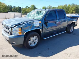 2010 Chevrolet Silverado 1500 LT with VIN 3GCRCSE09AG151287, listed as a IAAI auction lot 40532023 with 154,535 mi miles. Bid and sale history available at carsss.com. Image 2.