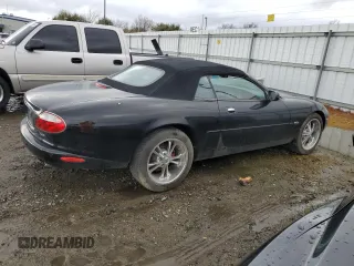 2002 Jaguar XK with VIN SAJDA42C12NA23956, listed as a Copart auction lot 45432365 with 84,827 mi miles and Clean Title. Bid and sale history available at DreamBid. Image 3.