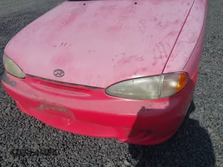 1995 Hyundai Accent z VIN KMHVD14N9SU047038, wystawiony jako IAAI lot #41895712 z przebiegiem 186 094 mil mil oraz . Historia ofert i sprzedaży dostępna na DreamBid. Obrazek 6.