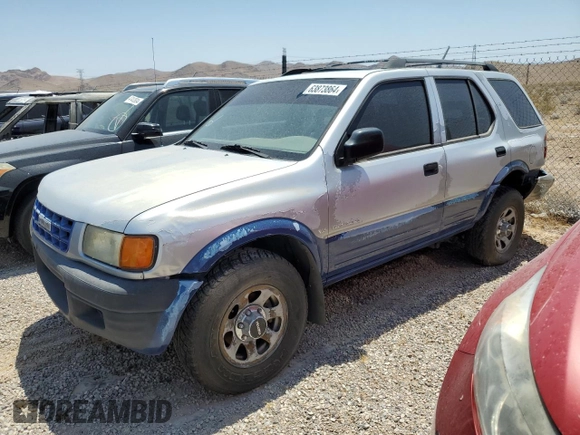 1999 Isuzu Rodeo S with VIN 4S2CK58W2X4361475, listed as a Copart auction lot 63873864 with 232,406 mi miles and Salvage Title. Bid and sale history available at DreamBid. Image 1.