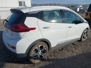 2018 Chevrolet Bolt EV Premier with VIN 1G1FX6S08J4139950, listed as a IAAI auction lot 41151990 with 137,041 mi miles. Bid and sale history available at carsss.com. Image 4.