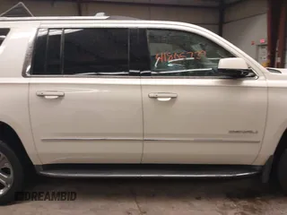 2015 GMC Yukon XL Denali with VIN 1GKS2JKJ1FR635901, listed as a IAAI auction lot 41805739 with 120,998 mi miles and . Bid and sale history available at carsss.com. Image 14.