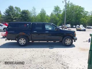 2012 GMC Canyon SLE1 z VIN 1GTH6MFE6C8140488, wystawiony jako IAAI lot #42399125 z przebiegiem 92 729 mil mil oraz . Historia ofert i sprzedaży dostępna na DreamBid. Obrazek 13.