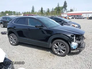 2023 Mazda CX-30 S Carbon Edition with VIN 3MVDMBCM3PM562447, listed as a IAAI auction lot 42174280 with 22,028 mi miles and . Bid and sale history available at DreamBid. Image 14.