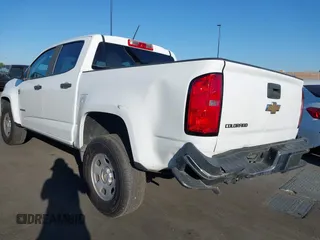 2019 Chevrolet Colorado 2WD Work Truck with VIN 1GCGSBEA1K1115077, listed as a IAAI auction lot 41653601 with 92,537 mi miles and . Bid and sale history available at DreamBid. Image 3.