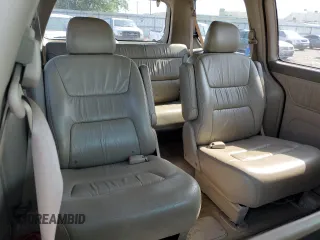 2004 Honda Odyssey EX-L with VIN 5FNRL18934B107378, listed as a Copart auction lot 51972795 with 186,043 mi miles and Salvage Title. Bid and sale history available at DreamBid. Image 12.