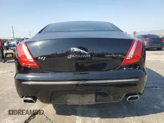 2011 Jaguar XJ with VIN SAJWA1CB4BLV05830, listed as a Copart auction lot 43007345 with 72,933 mi miles and Salvage title. Bid and sale history available at DreamBid. Image 6.