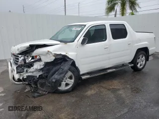 2014 Honda Ridgeline RTL with VIN 5FPYK1F57EB009851, listed as a Copart auction lot 62319504 with 55,718 mi miles and Clean Title. Bid and sale history available at carsss.com. Image 1.