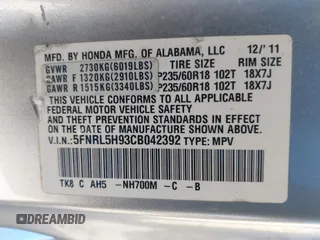 2012 Honda Odyssey Touring with VIN 5FNRL5H93CB042392, listed as a IAAI auction lot 41859533 with 169,141 mi miles. Bid and sale history available at carsss.com. Image 9.