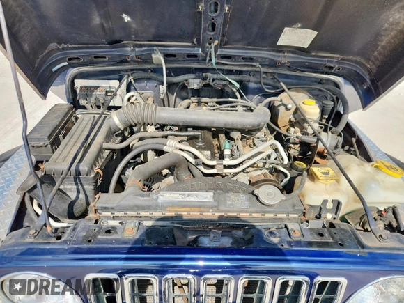 2006 Jeep Wrangler X with VIN 1J4FA39S66P775734, listed as a Copart auction lot 59903755 with 145,041 mi miles and Clean title. Bid and sale history available at DreamBid. Image 12.