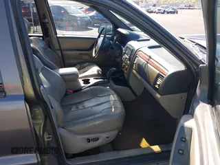 1999 Jeep Grand Cherokee Laredo with VIN 1J4GW58N2XC652678, listed as a IAAI auction lot 42290732 with 145,602 mi miles and . Bid and sale history available at DreamBid. Image 5.