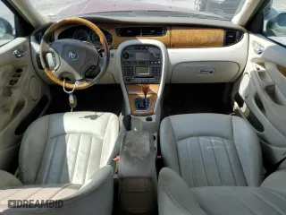 2004 Jaguar X-Type with VIN SAJEA51CX4WD60022, listed as a Copart auction lot 70491824 with 121,443 mi miles and Salvage Title. Bid and sale history available at carsss.com. Image 8.