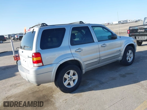 2006 Ford Escape Hybrid with VIN 1FMCU96H96KA25796, listed as a IAAI auction lot 41796914 with 119,809 mi miles and . Bid and sale history available at DreamBid. Image 4.